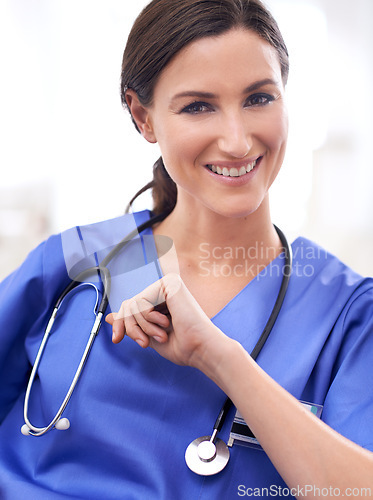 Image of Portrait, nurse and happy woman in hospital for healthcare, wellness or working on career in Spain. Face, medical professional and smile of surgeon, employee or expert doctor in clinic for service