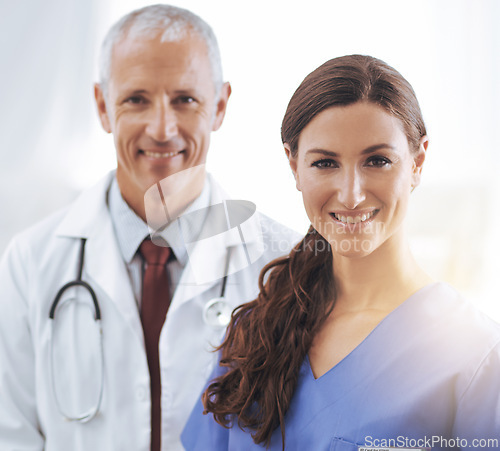 Image of Doctor, nurse and happy together in portrait with smile, medical support and wellness in hospital. Medic, mature man and woman in team, smile and healthcare services in clinic with pride for career