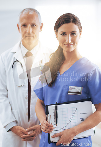 Image of Doctor, nurse and happy with partner in portrait with documents, charts and wellness in hospital. Medic, man and woman in team with graph paper for healthcare services in clinic with pride for job