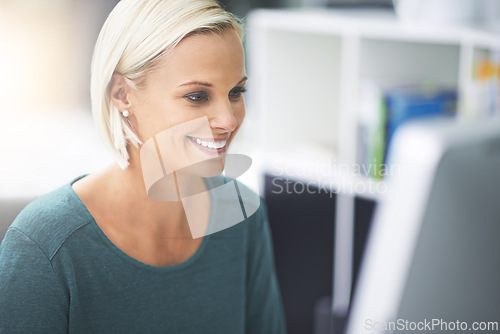 Image of Business woman, computer and happy for reading, review or thinking with email notification in office. Person, employee and smile for research, contact or information on web with pc at creative agency