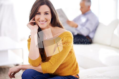 Image of Woman, happy and portrait at home in the morning on living room sofa with confidence. Female person, smile and couple in house with marriage and love on couch with relationship in a lounge on a break