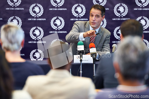 Image of Politician man, press conference and announcement on news with journalist group in audience for questions. People, interview and story with information for public relations, global seminar and crowd