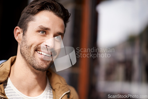 Image of Man, face and smile in city with fashion on mockup space with urban style, trendy outfit and confidence. Male person, happiness and relax outdoor in town with wellness, casual clothes or morning trip