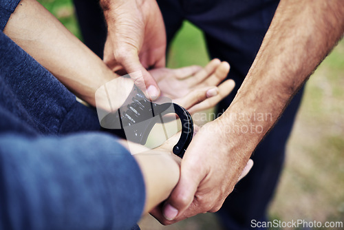 Image of Police officer, handcuffs and closeup to arrest person for crime with safety, protection or security. People, law enforcement and government service for justice, peace and stop danger in society