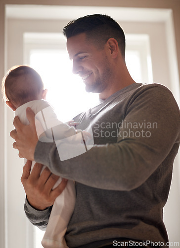 Image of Father and baby, love and happy in a house with care, trust and child development, support or bonding. Family, security and dad with kid at home for learning, safety or morning games with gratitude