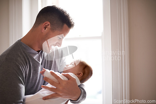 Image of Father, baby and home window with care, love and support together with family bonding and development. Dad, smile and young child in a house with kid and parent happy and proud about infant growth