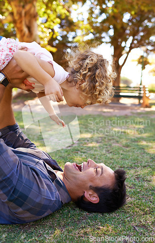 Image of Plane, father and daughter with playing in park on grass for fun game, bonding and healthy relationship with energy. Happy family, man or girl child with airplane, childhood fantasy or flying outdoor