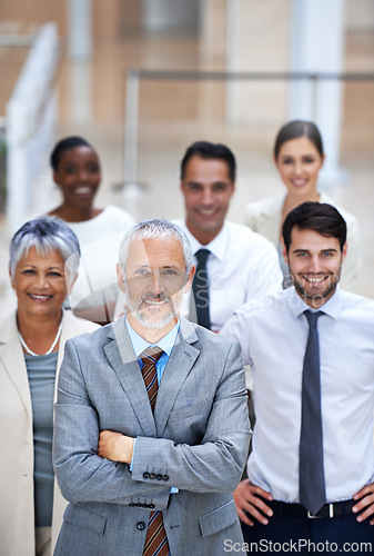 Image of Portrait, leadership and group of business people with confidence, solidarity and support at startup. Community, professional men and women together in office with teamwork, pride and arms crossed