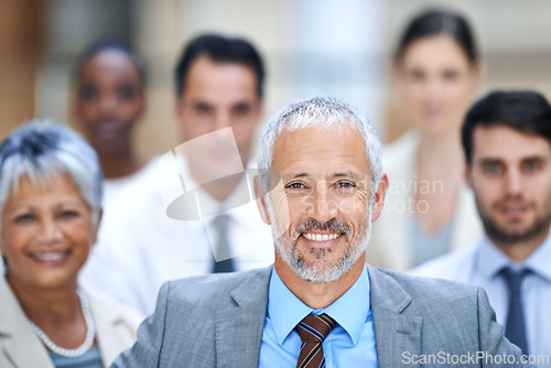 Image of Portrait, leadership and group of business people with mature manager, confidence or solidarity at startup. Community, professional men and women together in office with teamwork, pride and happy CEO