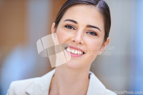 Image of Business woman, portrait and smile for career, job and workplace confidence in human resources. Face of a young person, worker or employee in blurred background with closeup, integrity and values