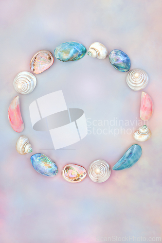 Image of Mother of Pearl Sea Shell Wreath on Rainbow Sky