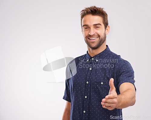 Image of Studio, portrait and welcome handshake from man in background or introduction in mockup space. Hand, gesture or happy networking for business with confidence and hr person say hello or thank you