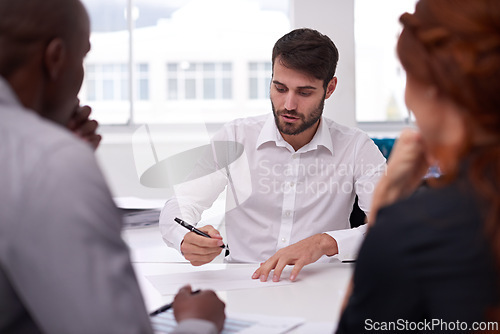 Image of Meeting, business people and planning in conference room for discussion, collaboration or idea. Office, coworkers and diverse group of employees together for teamwork, review or strategy on project