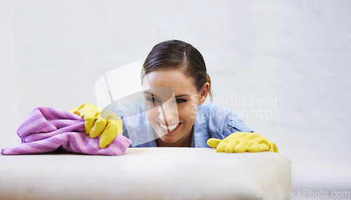 Image of Woman, gloves and cleaning table or rag, disinfection and remove dirt or bacteria for maintenance. Female person, housekeeeping and wash with detergent or sanitation, home and chemical for germs