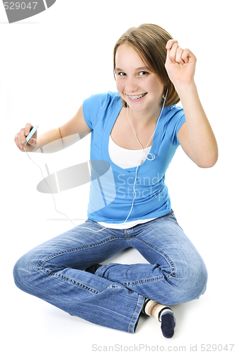 Image of Teenage girl listening to music