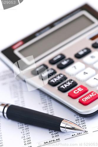 Image of Tax calculator and pen