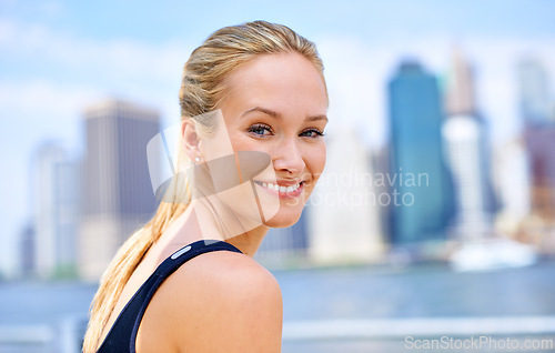 Image of Woman, workout and portrait by river in city for morning routine, wellness and exercise for active cardio. Female person, happy and fitness runner or athlete for sports hobby or training in New York.