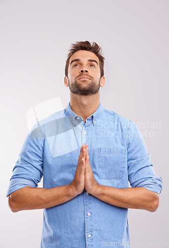 Image of Man, praying and worship with praise for God, seek help and advice for guidance with hands together on white background. Spiritual, faith and gratitude with thanks, religion and forgiveness with hope