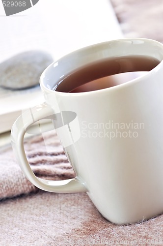 Image of Relaxing reading with tea