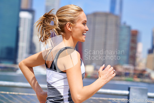 Image of Woman, excited and running for fitness in city, jogging active and fit female person exercising in New York. Energy, marathon for sports training and workout for athlete, cardio wellness or endurance