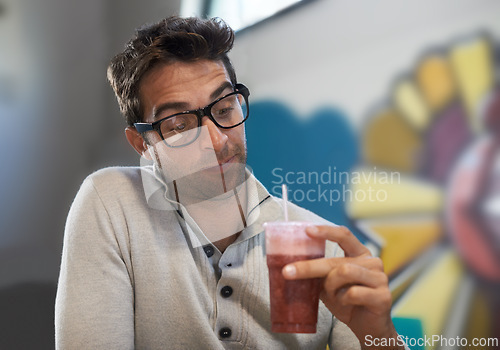 Image of Choice, drink and smoothie for man, breakfast and healthy for diet of strawberry, fruit and show of beverage. Male person, guy and adult relax with blended cocktail for energy, wellness and nutrition