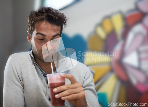 Image of Happy, drink and smoothie for man with smile for healthy diet of strawberry, fruit and show of beverage. Male person, guy and adult relax with blended cocktail for energy, wellness and nutrition