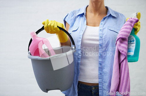 Image of Woman, cleaning and supplies for housekeeping in home, bleach and detergent for sanitation or disinfection. Female person, bucket and maid for sterilization, cloth and rubber gloves for hygiene