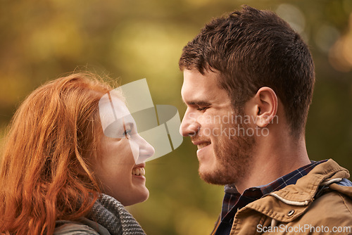 Image of Park, date and couple with love or care on holiday adventure or relax on vacation in woods. Happy, man and woman with smile for support and kindness in marriage and travel forest together in spring