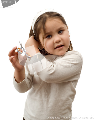 Image of Child Cutting Their Own Hair