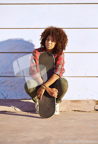 Image of Skateboard, fashion and portrait of black woman for competition, hobby and exercise in skatepark. Skater, smile and face of female person for trendy, edgy and hipster clothing in San Francisco