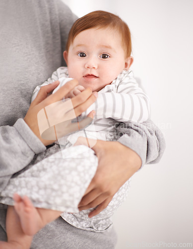 Image of Baby, love and portrait of infant with mother for comfort, safety and adoption of child at family home. Newborn, parent and happy little kid in house with support, care and bonding for development