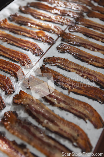 Image of Freshly cooked crispy bacon strips