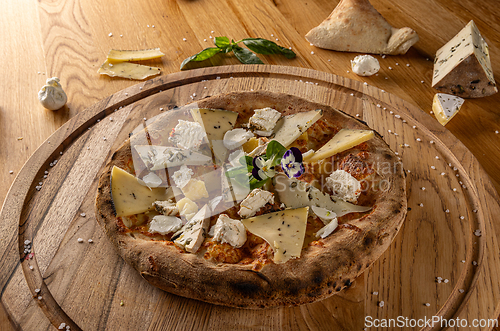 Image of Artisan pizza with a variety of cheeses