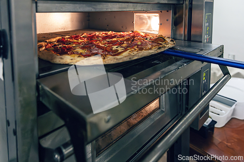 Image of Fresh pizza baking