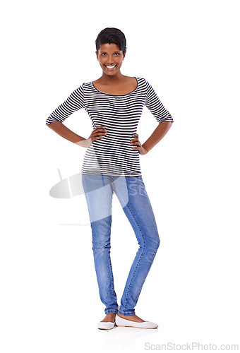 Image of Indian woman, fashion and smile in studio portrait with confidence, pride and jeans by white background. Girl, person and cool model with edgy denim, shirt and happy with trendy with casual style