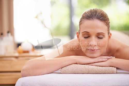 Image of Girl, massage or relax at spa, wellness or holistic as peace, natural or therapy in self care. Woman, towel or zen in detox, balance or cosmetology at bodycare, clinic or retreat at luxury resort