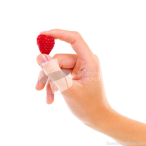 Image of Hand, raspberry and healthy food for nutrition, wellness and weight loss with ingredient isolated on white background. Person with fruit, sweet or sour with diet, red berries for detox and vegan