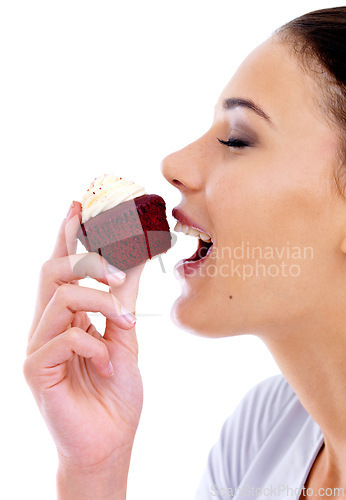 Image of Studio, woman and cupcake with happiness for nutrition, eating muffin and unhealthy diet. Female person, food and sweet dessert with cake, snack enjoyment and satisfaction on white background