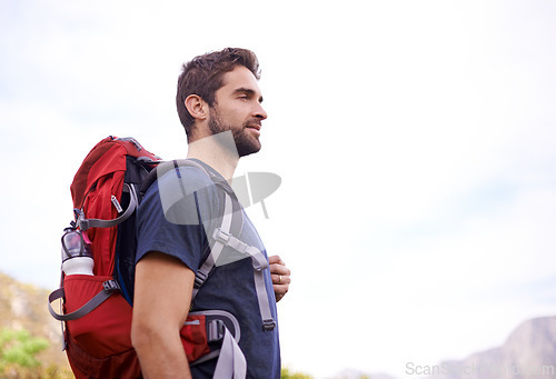 Image of Man, hiking and nature for exercise, health and wellness with view and mountain. Athlete, fitness and adventure with summer, sunshine and backpack journey on cape town trail with travel and vacation