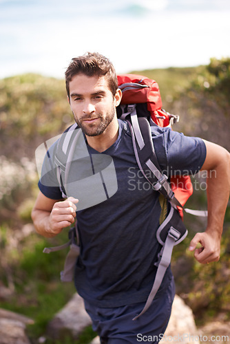 Image of Athlete, hiking and nature for fitness, health and wellness with back and mountain. Man, exercise and adventure with summer, sunshine and backpack journey on cape town trail with travel and vacation