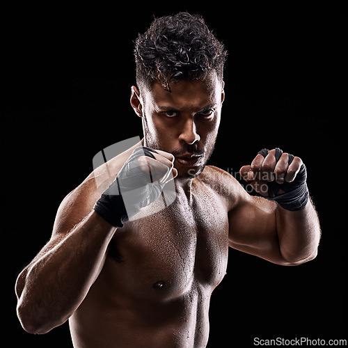 Image of Boxing, fitness and portrait of man with hands for sport, exercise and workout isolated in black background. Male person, athlete and boxer in studio backdrop for wellness, training and health