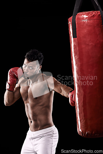 Image of Man, box and punching bag for active, exercise and health for wellness and sports with muscles in studio. African person and punch for strong, fitness and power for recreation and workout for fight