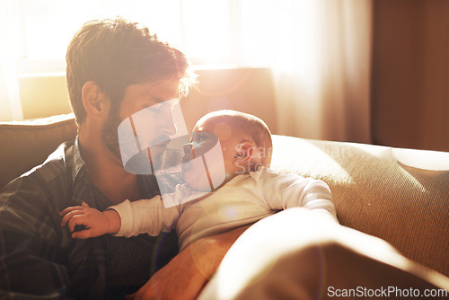 Image of Love, morning and father with baby on sofa for bonding, relationship and care for parenting. Family, home and dad with newborn infant for child development, support and affection in living room