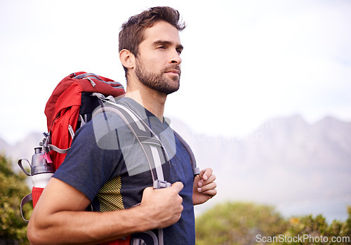 Image of Man, hiking and mountain for fitness, health and wellness with view and nature. Athlete, exercise and adventure with summer, sunshine and backpack journey on cape town trail with travel and vacation