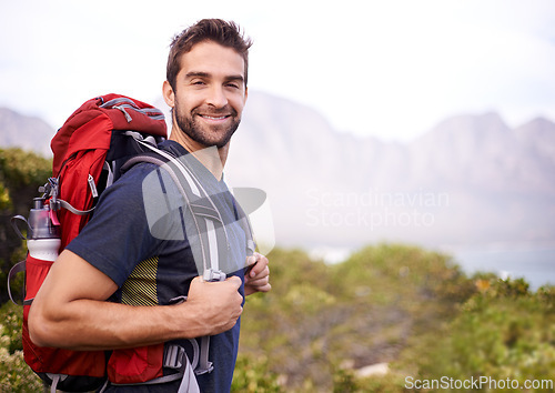 Image of Man, happy and hike for fitness with backpack for adventure, workout and hobby to explore in New Zealand. Portrait, smile and outdoor activity in nature for health in woods and summer holiday