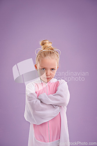 Image of Girl, bunny and plush with attitude, studio and arms crossed for easter. Child, costume and youth with pastel, rabbit and grumpy for holiday with childhood dress up isolated on purple background