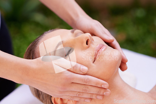 Image of Happy woman, sleeping and face massage with masseuse for zen, skincare or stress relief at spa, hotel or resort. Closeup of female person asleep in relaxation for facial, beauty or body treatment