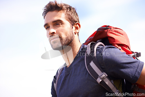 Image of Man, hike and backpack for recreation in environment for nature and outdoor for fitness in summer. Young person and look with bag for active, walk and adventure for exercise and sport for trail