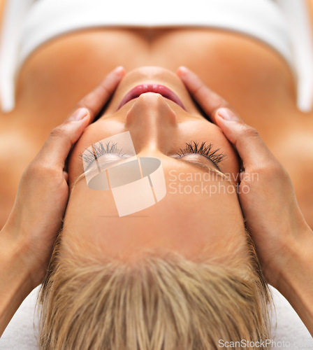 Image of Closeup, hand or woman in head, massage or luxury to relax, wellness or self care as mental health. Client, chakra or zen to trust, work or sleep of dream, salon table or cosmetology therapy