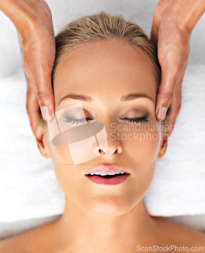 Image of Resort, closeup or woman in head, massage or mental health as self care, relax or luxury wellness. Retreat, girl or hand in spa, therapy or zen of clinic, sleeping or peace on cosmetology table